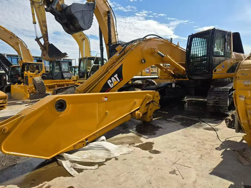 Used excavators lined up in the yard in Hefei, China, waiting for pre-shipment inspection